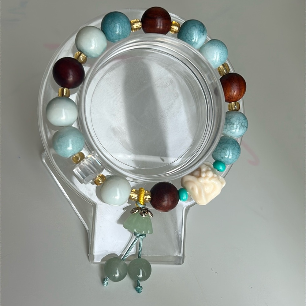 Lotus glass bead charm bracelet